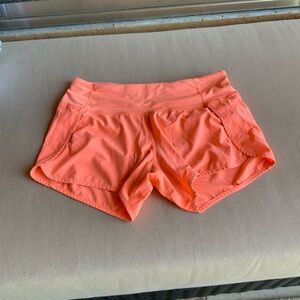 lululemon Bright Orange Athletic Shorts mid rise size 6 with 3” inseam